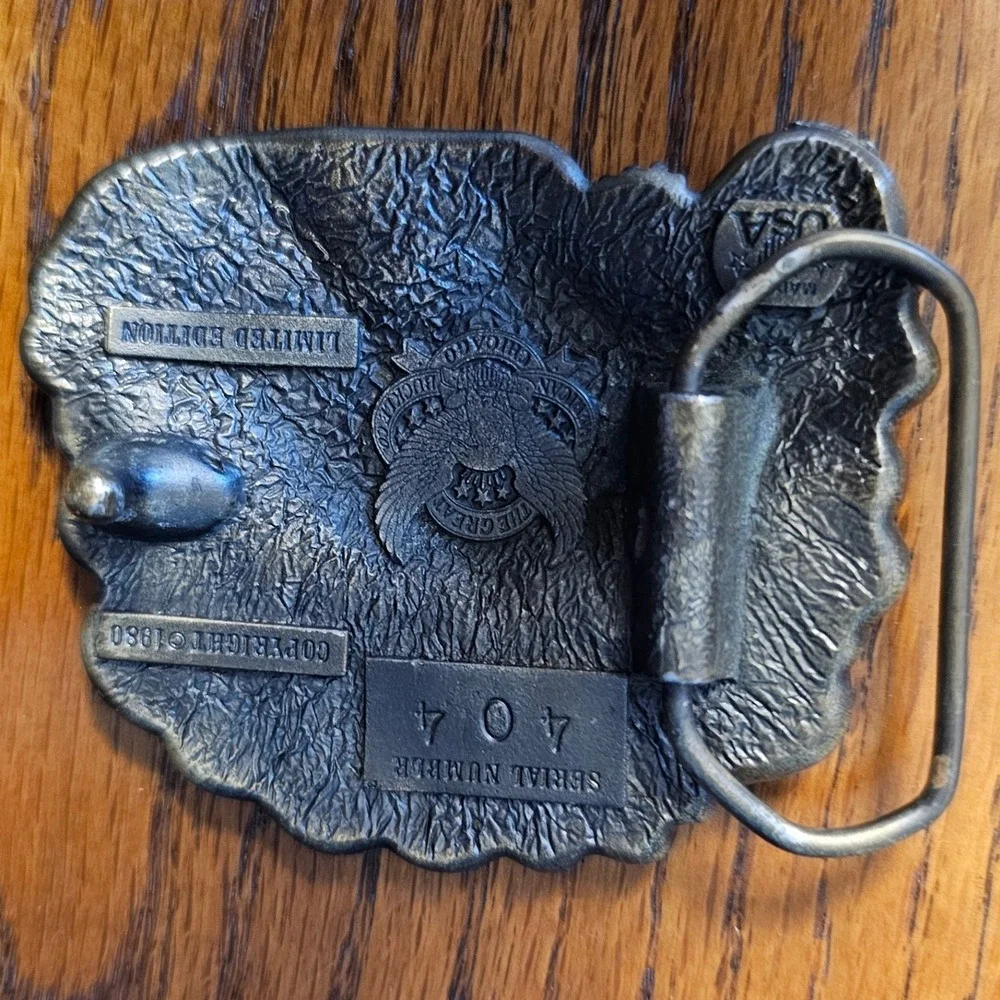 Great American Buckle Co 1980 4-Wheelers Do It In The Dust Brass Belt Buckle 404